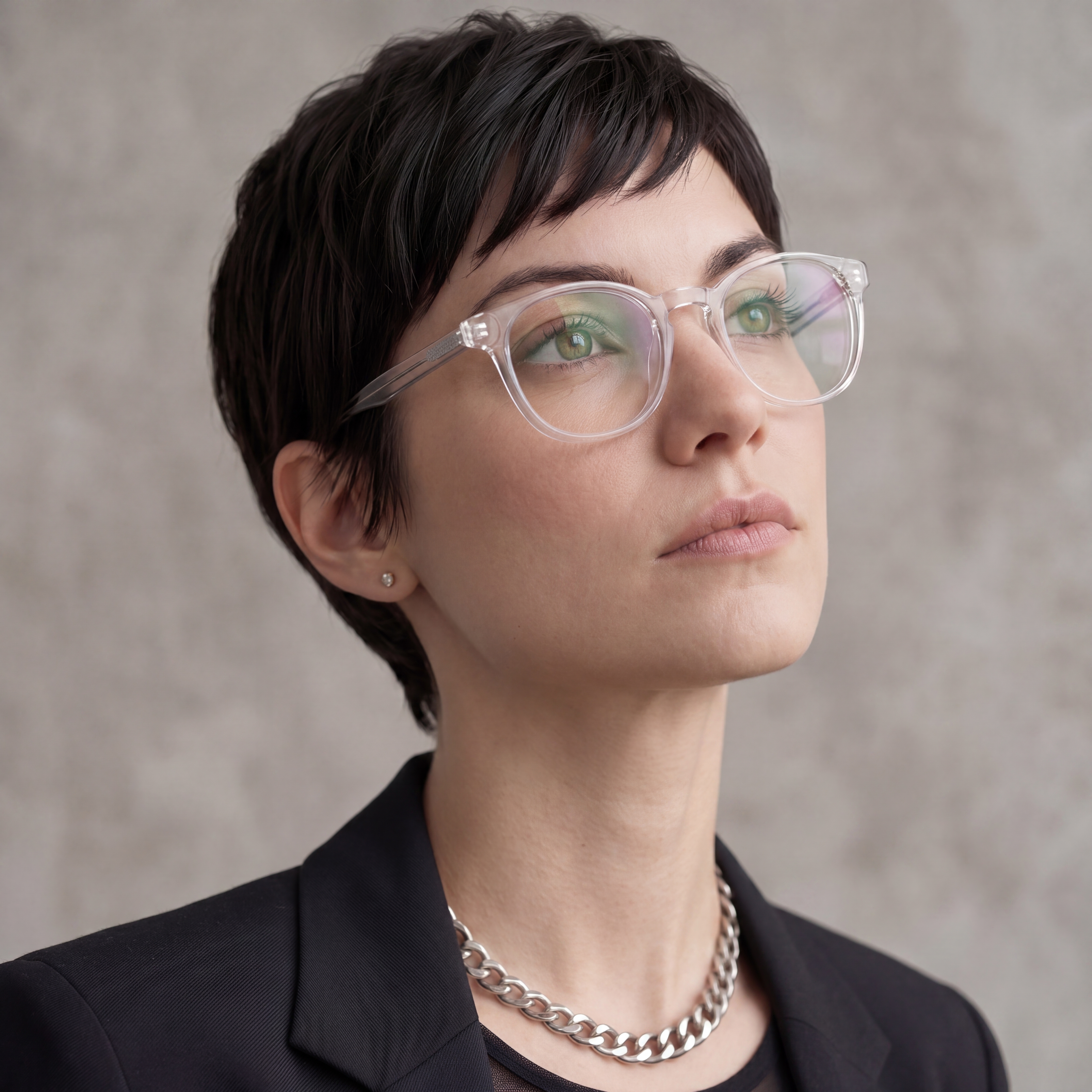 Model wearing clear designer glasses